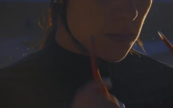 Stock Video Cyclist Girl Puts On Sunglasses To Train On A Track For PC