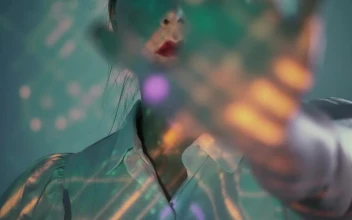 Stock Video Cyborg Raising Hand While Being Programmed For PC