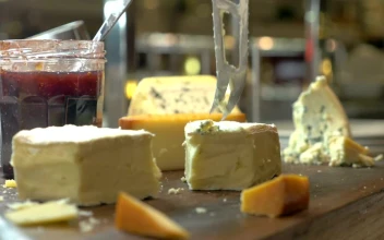 Stock Video Cutting Up Soft Cheese For PC