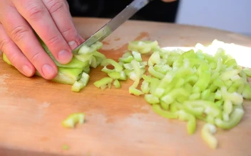 Stock Video Cutting Up A Pepper In The Kitchen For PC