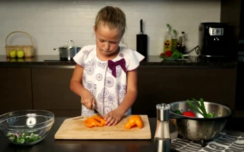 Stock Video Cutting Peppers In The Kitchen For PC