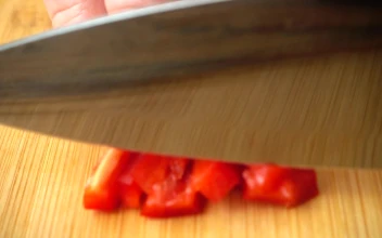 Stock Video Cutting Peppers Into Chunks For PC