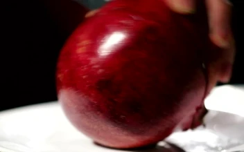 Stock Video Cutting Open A Pomegranate For PC