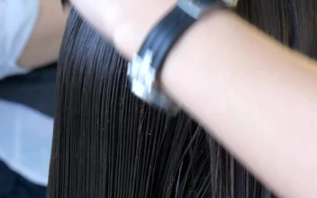 Stock Video Cutting A Womans Hair With Fire For PC