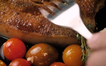 Stock Video Cutting A Pork Chop For PC