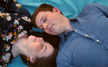 Stock Video Cute Happy Couple Lying On The Grass For PC