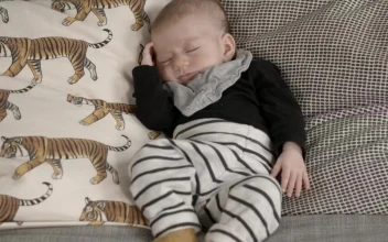 Stock Video Cute Baby Sleeping On A Couch For PC