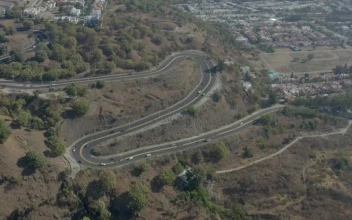 Stock Video Curved Highway Going Down A Hill For PC
