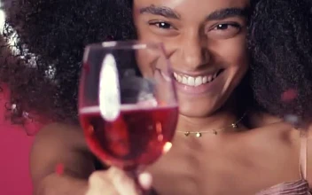 Stock Video Curly Haired Young Woman Toasting On Valentines Day For PC