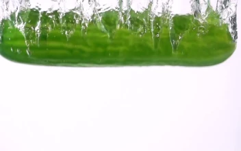 Stock Video Cucumber Falling Through Water For PC