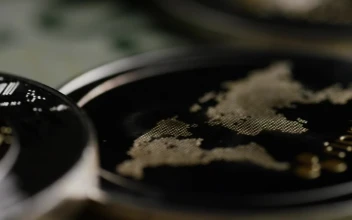 Stock Video Cryptocurrency Coins And Dollar Bills Close Up For PC