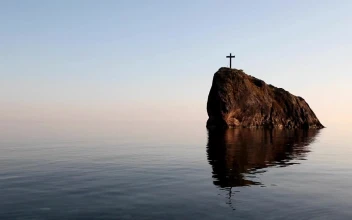 Stock Video Crucifix On A Cliff In The Sea Landscape For PC