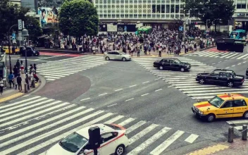 Stock Video Crowds Of People Cross A Street Junction For PC