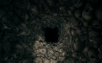 Stock Video Creepy Dark Cave Full Of Skulls For PC
