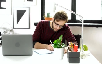 Stock Video Creative Man Works On Web Design In Modern Office For PC