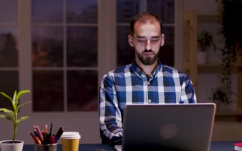 Stock Video Creative Man Thinking About Work Project At Desk For PC