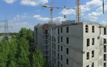 Stock Video Cranes On A Building Side By The Highway For PC