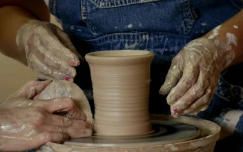 Stock Video Craftsman Women Shaping A Clay Vase For PC
