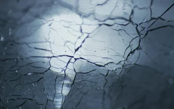Stock Video Cracked Ice Texture With Light On The Background For PC