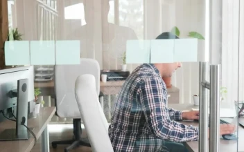 Stock Video Cowoworkers Look Through Ideas On Sticky Notes For PC
