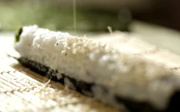 Stock Video Covering A Sushi Roll For PC