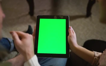 Stock Video Couple Watching Together A Tablet With Green Chroma For PC