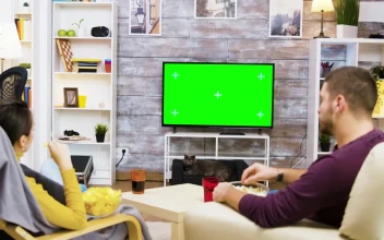 Stock Video Couple Watching Green Screen Tv And Eating Popcorn For PC