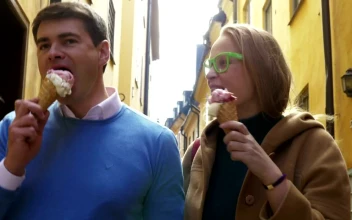 Stock Video Couple Walking Around Town With Ice Cream For PC