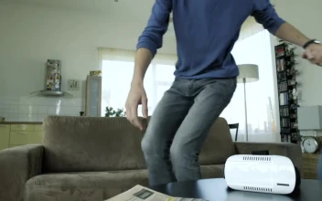 Stock Video Couple Trying Vr Glasses On The Living Room For PC