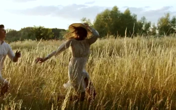 Stock Video Couple Take Romantic Run Through Country Field For PC