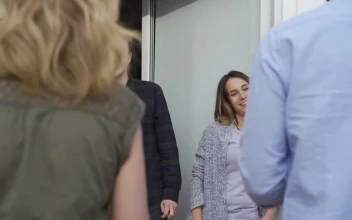 Stock Video Couple Receiving Welcome Gifts From Their Neighbors For PC