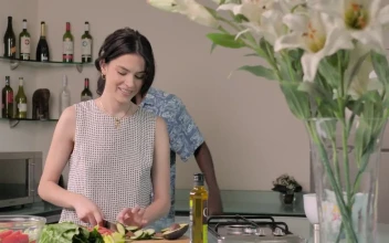 Stock Video Couple Preparing Salad At Home For PC