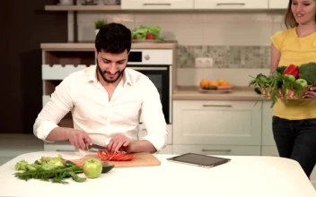 Stock Video Couple Preparing Dinner With Fresh Groceries For PC