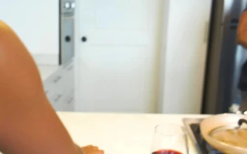 Stock Video Couple Playing Catch To Mouth Food While Cooking For PC