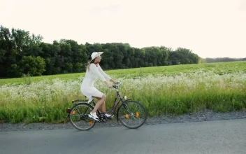 Stock Video Couple On Romantic Bike Ride In Spring Countryside For PC