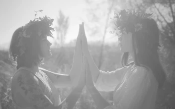 Stock Video Couple Of Women Performing A Small Ritual With Their Hands For PC