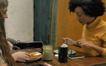 Stock Video Couple Of Girls Having Breakfast Together In A Restaurant For PC