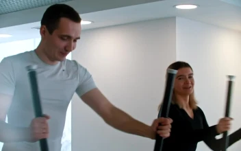 Stock Video Couple Of Friends Doing Cardio Exercise In The Gym For PC