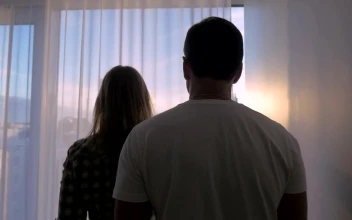 Stock Video Couple Looking Out Over A Large City For PC