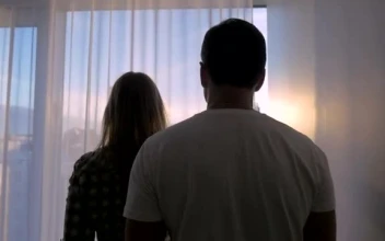 Stock Video Couple Looking Out Over A Large City  Smal For PC
