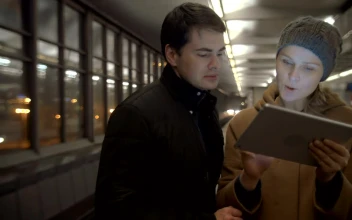 Stock Video Couple Looking For Directions On A Tablet For PC