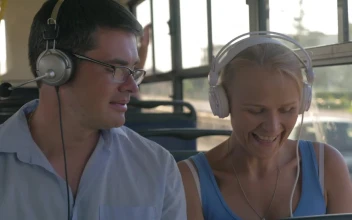Stock Video Couple Listening To Music On A Bus For PC