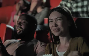 Stock Video Couple Laughing During A Comedy Film For PC