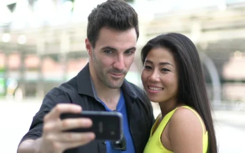 Stock Video Couple In Love Taking Selfies On The Street For PC