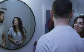 Stock Video Couple Having Fun While Brushing Their Teeth For PC
