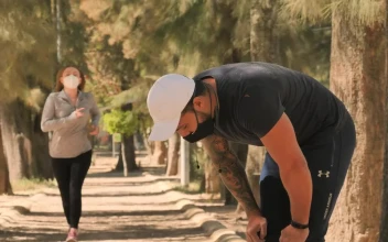 Stock Video Couple Gives A Hi Five After Running For PC