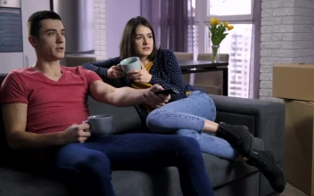 Stock Video Couple Drinking Tea On The Sofa For PC