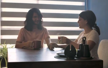 Stock Video Couple Drinking Coffee In Their Home For PC