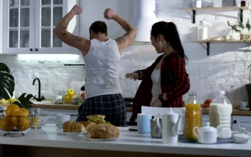 Stock Video Couple Dancing In The Kitchen Before Breakfast For PC
