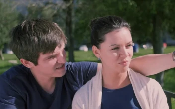 Stock Video Couple Chatting While Sitting In The Park For PC